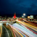 Captivating night view showcasing light trails on a bustling highway in Monterrey, Mexico.